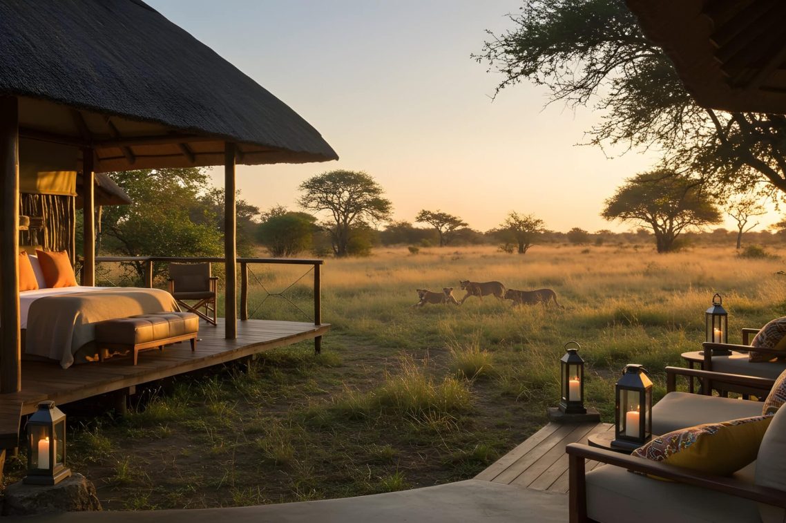 Luxury safari lodge with lions roaming freely in the African savanna Experience the thrill of nature from a luxurious safari lodge in the African savanna. Witness lions roaming freely in their natural habitat during a golden sunset. An unforgettable adventure awaits, offering both relaxation and wild beauty.
